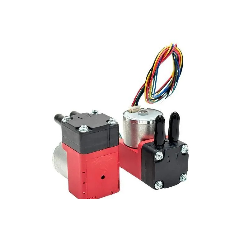 Hand Holding OD-05T033B Mini Diaphragm Pump to Show Size