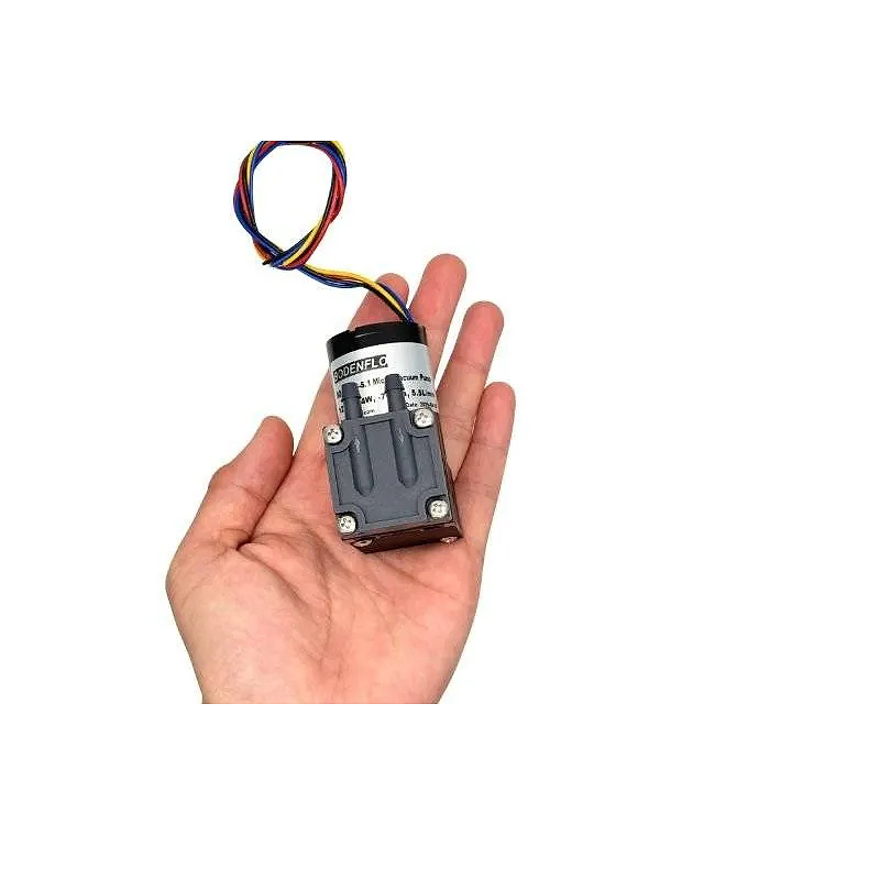 OD-05TVB-S.1 DC air pump size demonstration in hand for portable device integration