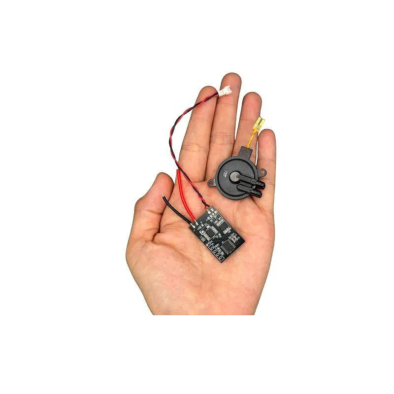 OD-05T01PZ09 compact piezo pump held in hand showing miniature size for portable devices